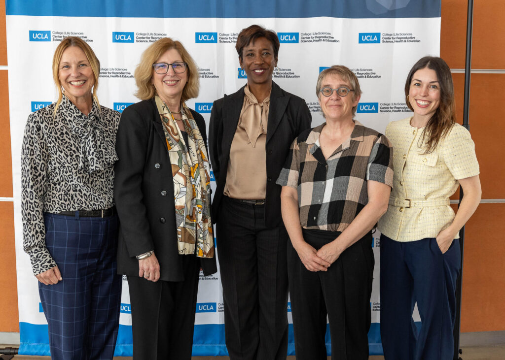 Group photo of Dr. Teresa Woodruff and attendees at the CRSHE Distinguished Speaker Series event on oncofertility.